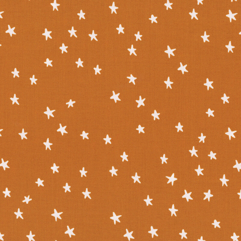 Copper fabric with a white star pattern.
