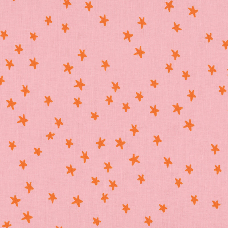 Blush pink fabric with an orange star pattern.