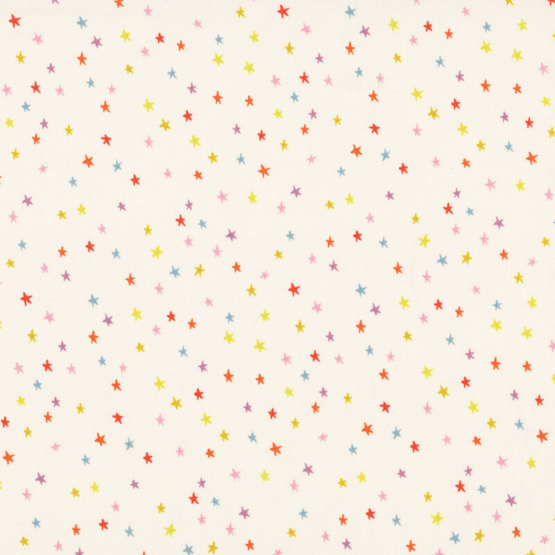 Pale cream fabric with a multicolored mini star pattern.