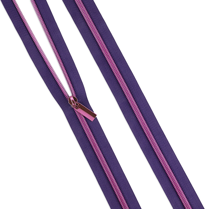 The moonbeam zipper laid out flat with a single zipper pull. 