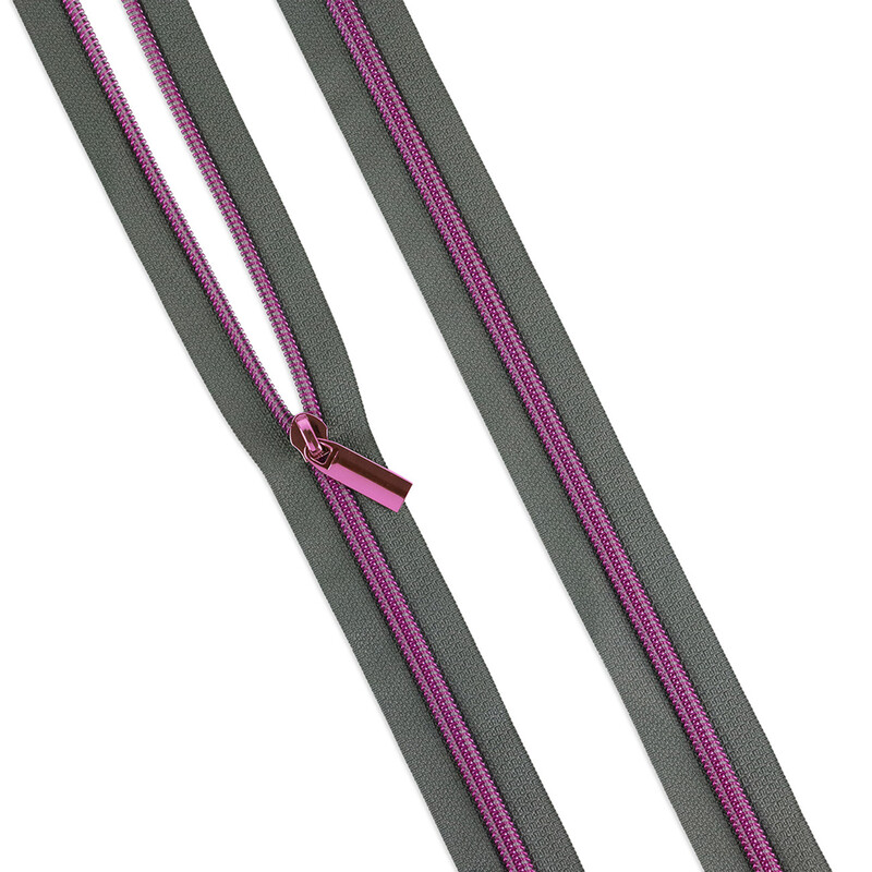 The grey zipper laid out flat with a single zipper pull. 