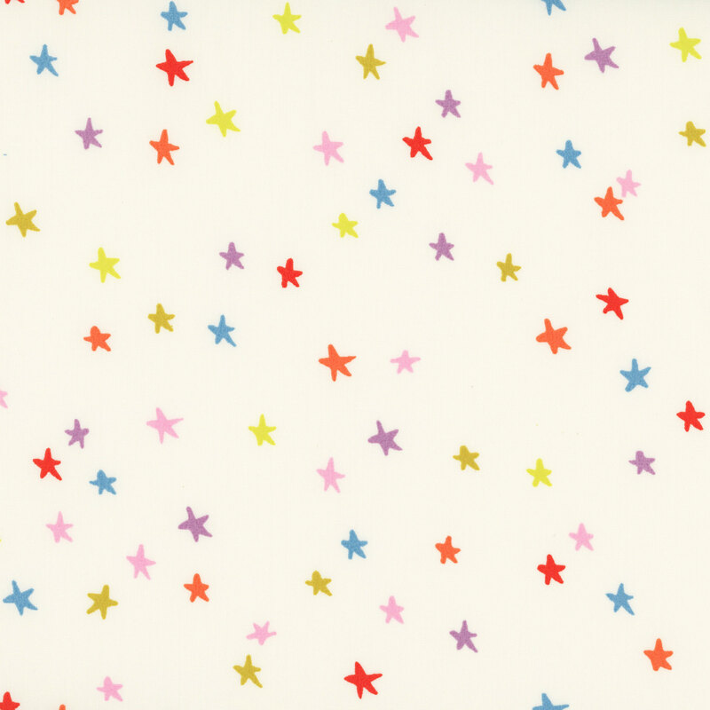 108" wide cream fabric featuring colorful stars.