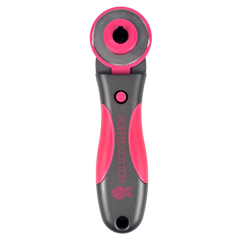 A gray and pink rotary cutter designed for quilting, featuring a circular blade and ergonomic handle.