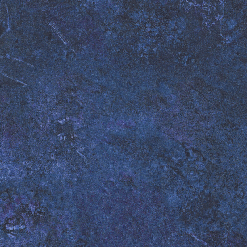 Navy blue fabric with a softly textured surface that emulates the look of natural stone. 