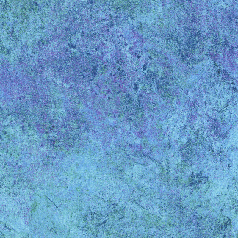 Ocean blue and iris fabric with a softly textured surface that emulates the look of natural stone. 