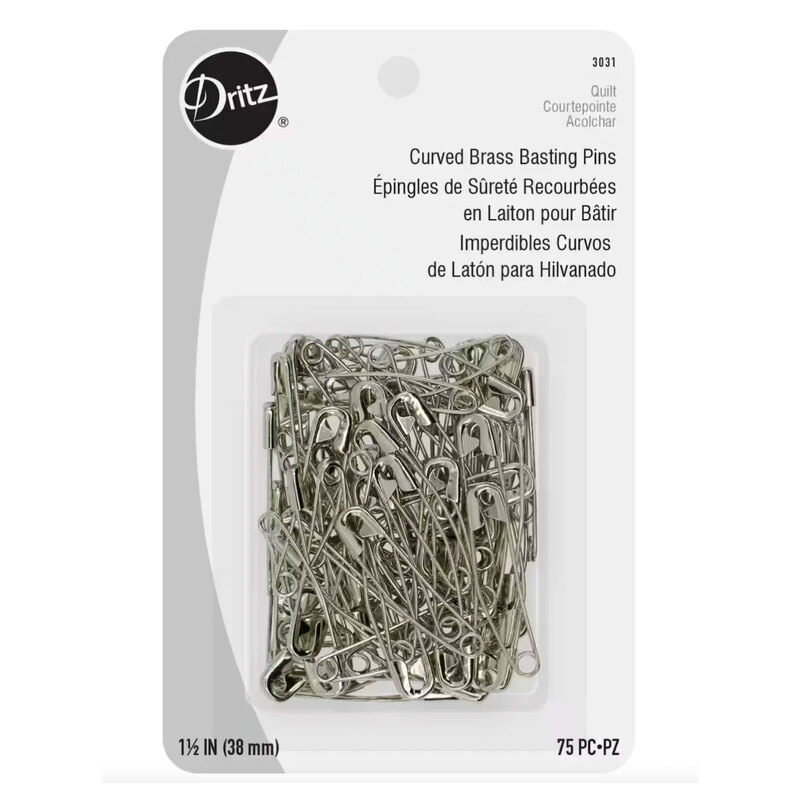 The curved brass basting Pins in its packaging isolated on a white background
