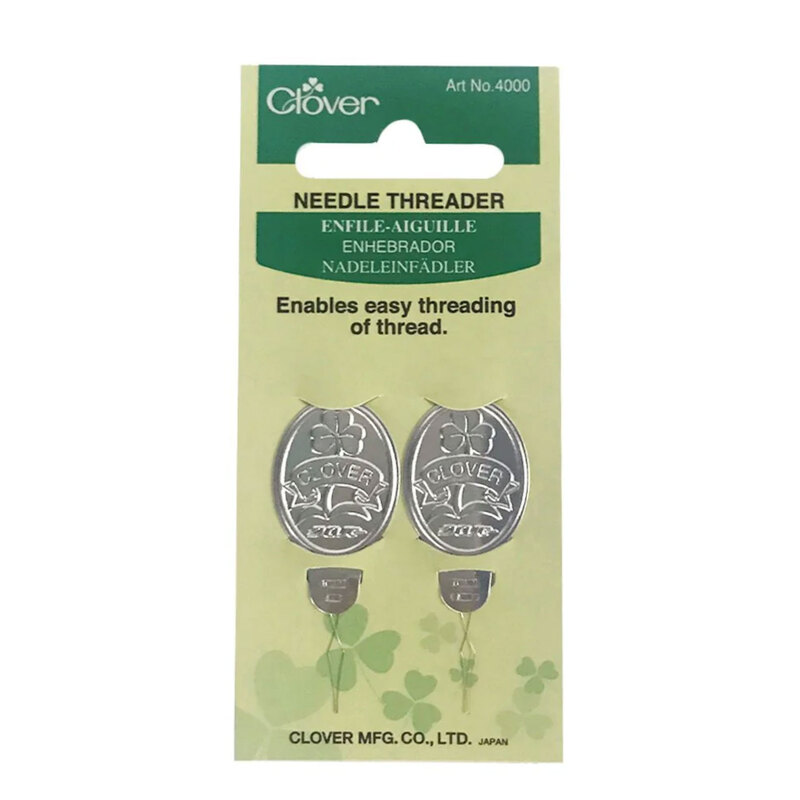The Clover Needle Threader in its packaging and isolated on a white background. 