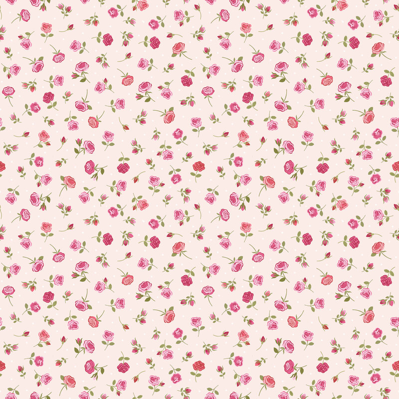 Light pink fabric with tossed dots and pink and red roses.