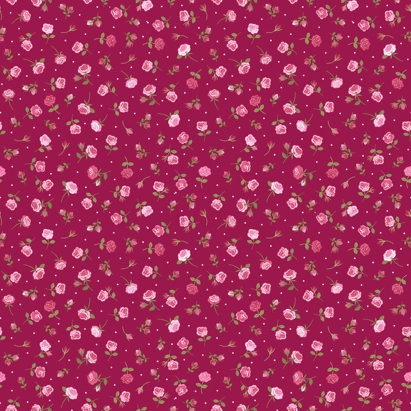 Dark raspberry fabric with tossed dots and pink and red roses.