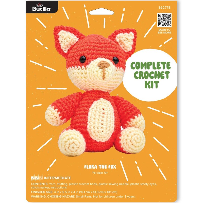 Package of a crochet kit featuring a colorful fox named flora.