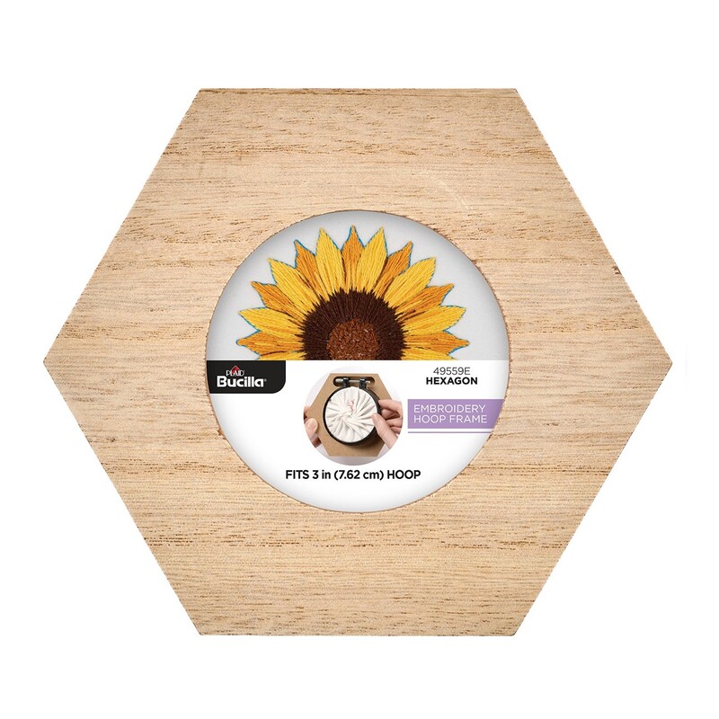 Hexagonal embroidery hoop frame with wood veneer finish.