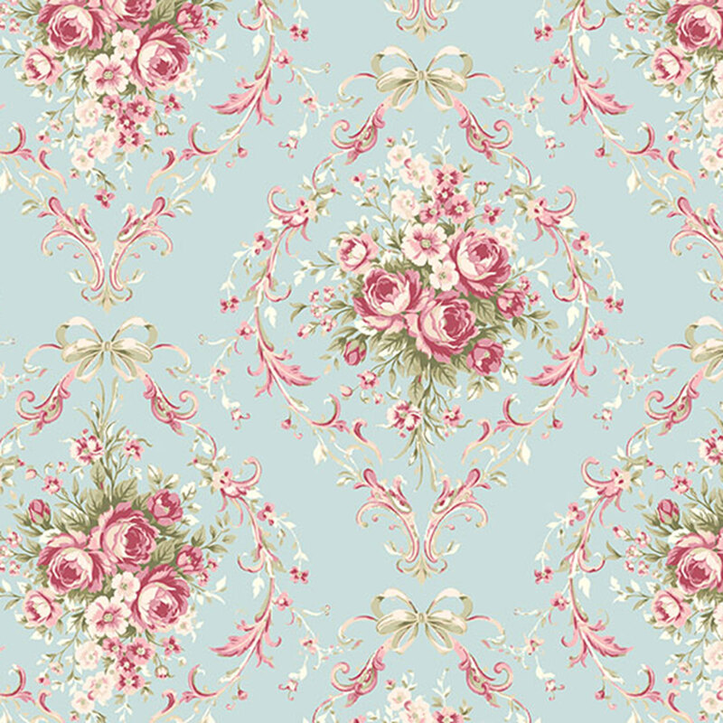 Light teal fabric with a damask pattern of pink and white roses topped with cream-colored bows.