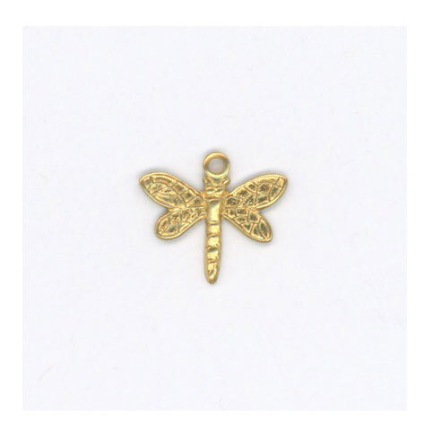 A dragonfly charm isolated on a white background. 