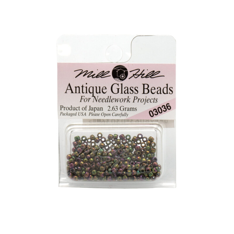 A package of Mill Hill Antique Glass Seed Beads in the color cognac. 