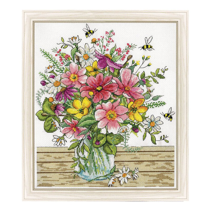 a framed and completed cross stitch project featuring a floral bouquet in a mason jar with bees buzzing around.