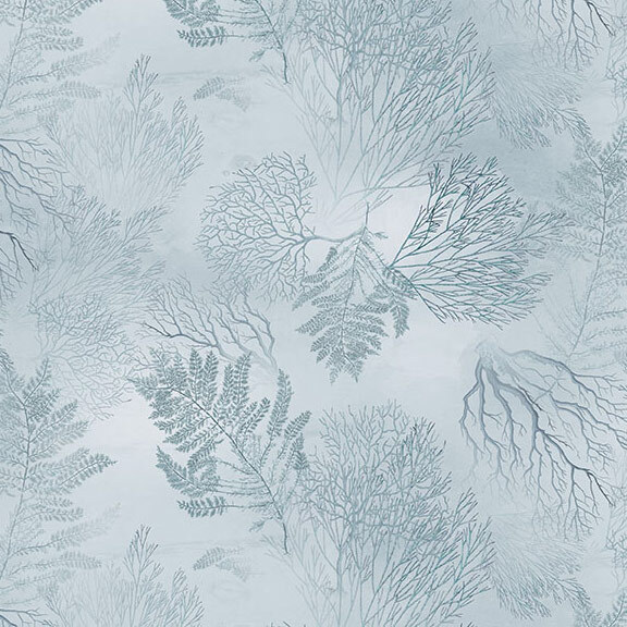 Mottled pale blue fabric with tonal leaves and branches.