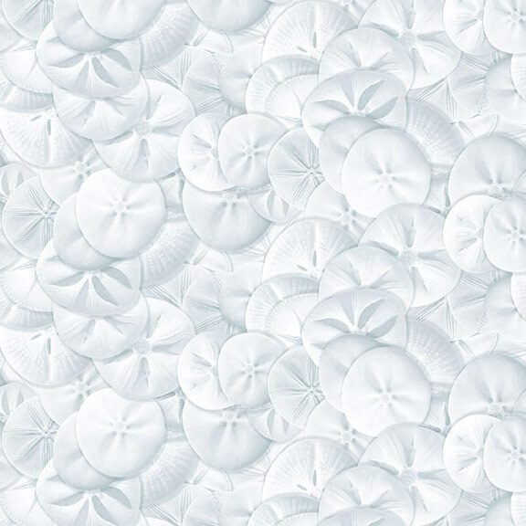 Packed fabric with a soft white assortment of sand dollars.