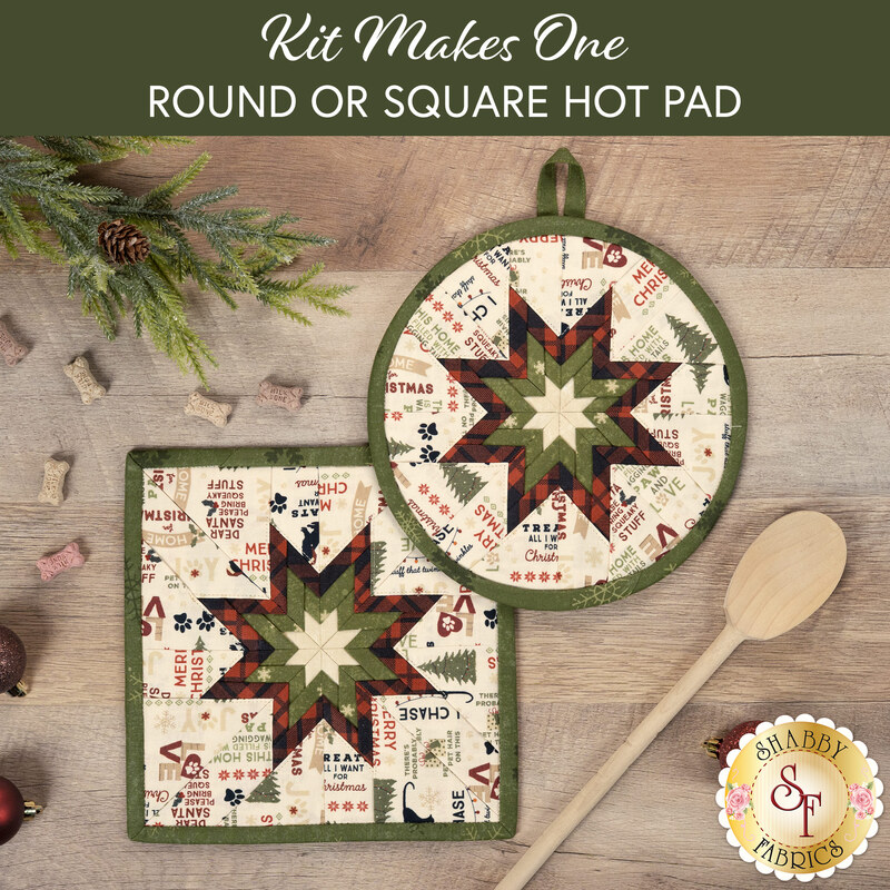 The two completed cream Folded Star Hot Pads, one round and one square, slightly overlapping each other and staged on a wood table with coordinating décor.