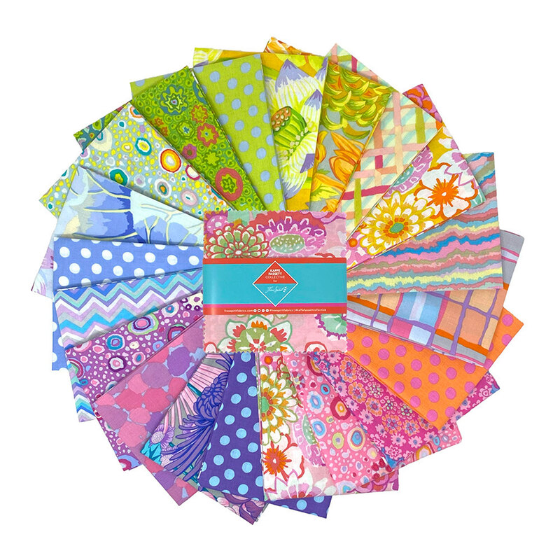 The Sorbet 5" Charm Squares, in their packaging, staged on top a circular arrangement of the included fabrics.