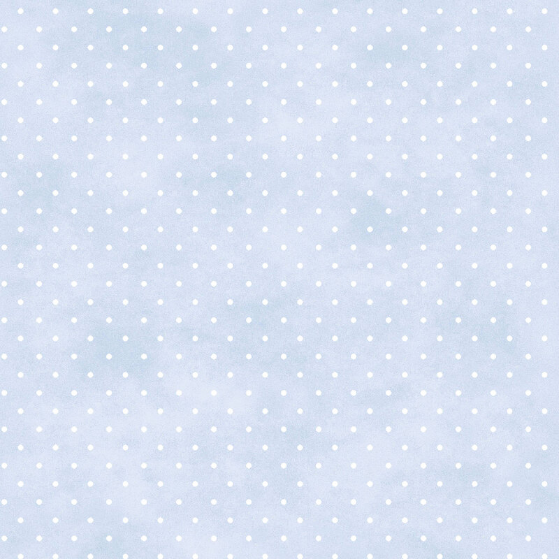 Mottled powder blue fabric with small white polka dot pattern.