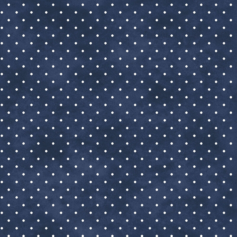 Mottled navy fabric with small white polka dot pattern.