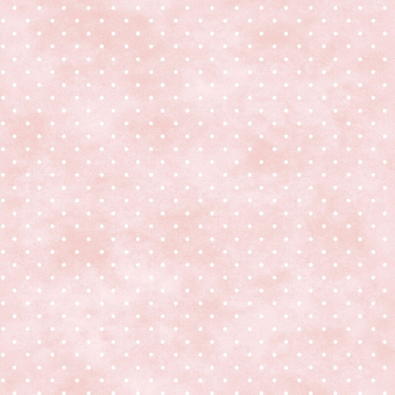Mottled soft pink fabric with small white polka dot pattern.