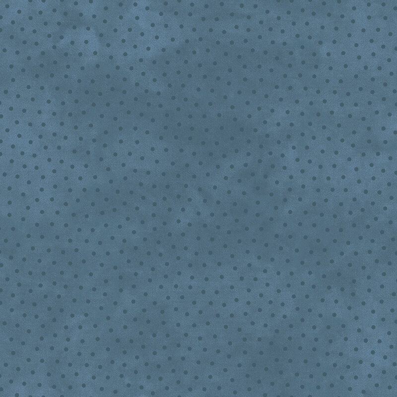 Mottled blue fabric with scattered tonal dots.