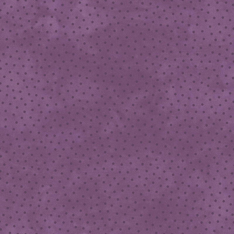 Mottled purple fabric with scattered tonal dots.