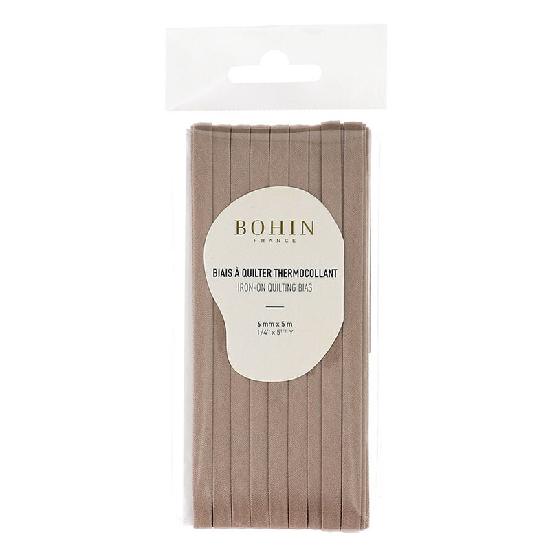 Taupe bias tape in packaging labeled Bohin iron on quilting bias, isolated on a white background.