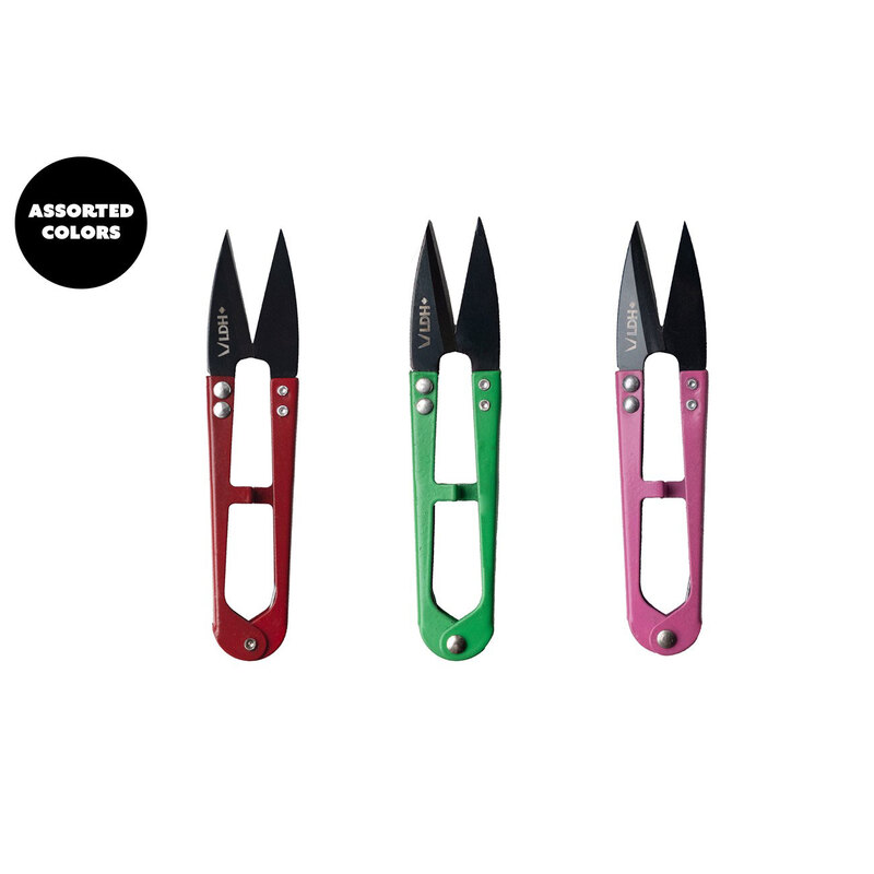 Three pairs of thread snip scissors (red, green, and pink) arranged side by side on a white surface.