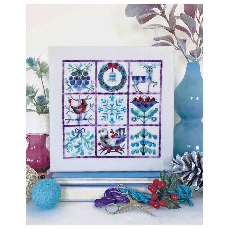finished Invierno project featuring winter animals and motifs staged with coordinating decor