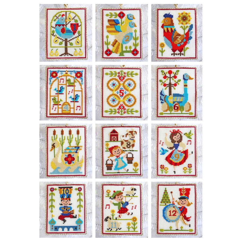 The 12 finished ornament projects from the Twelve Days of Christmas cross stitch pattern