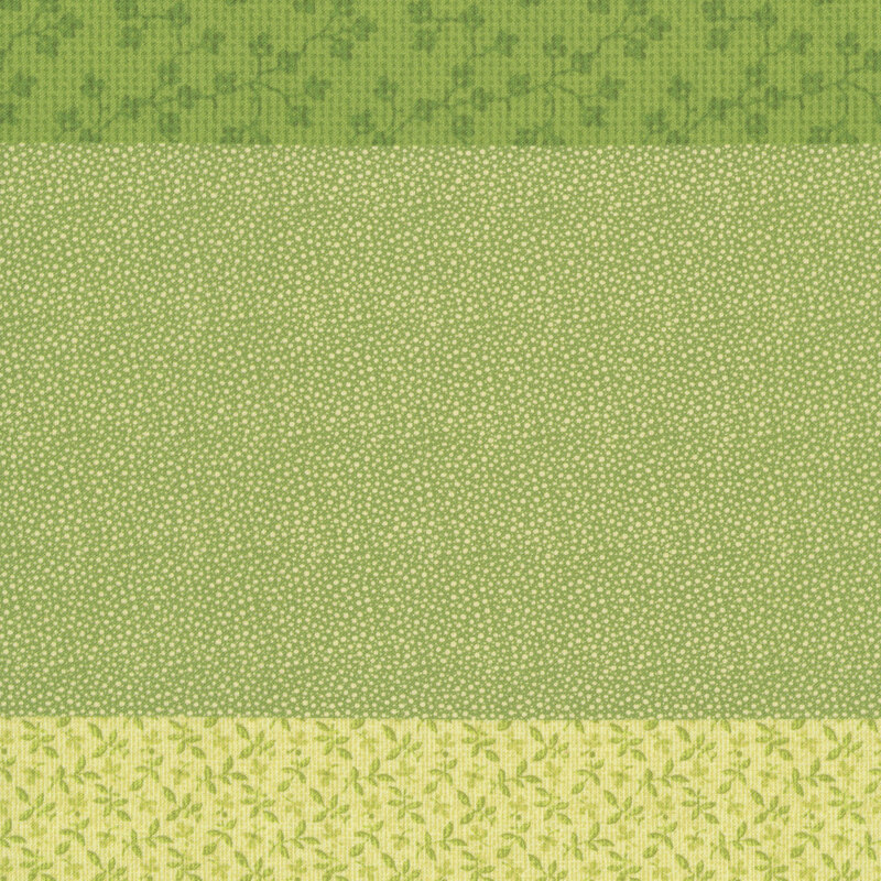 Green fabric with a distinctive striped design with 8 unique coordinating patterns, including florals, dots, leaves, and other classic motifs.