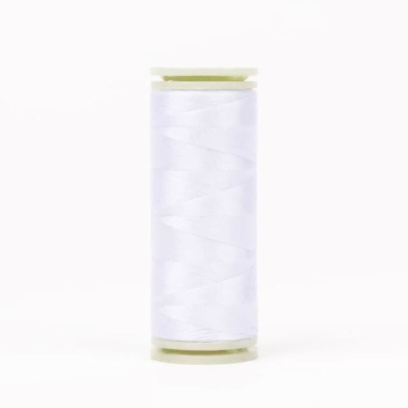 A spool of WonderFil DecoBob DB-104 White thread on a white background.