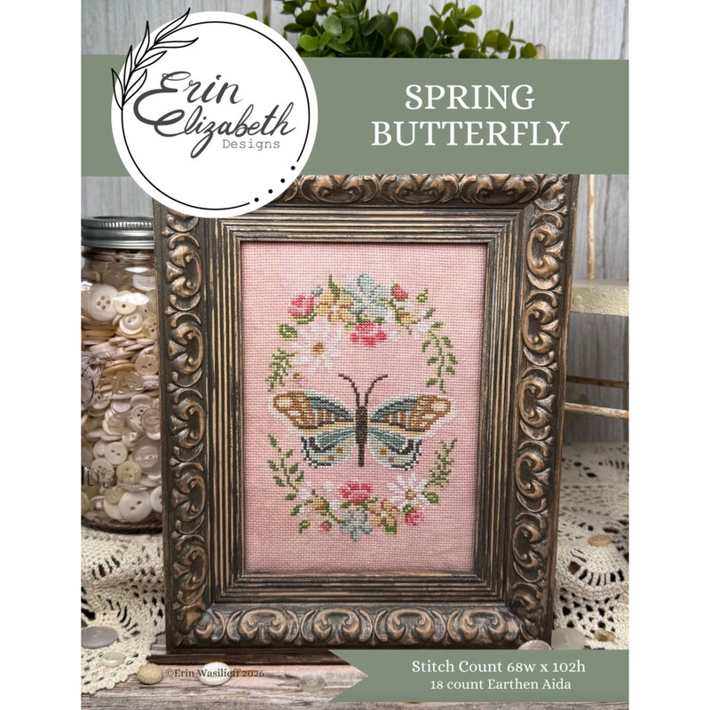 A finished and framed spring butterfly pattern with coordinating décor and a stitch count in the bottom right corner. 