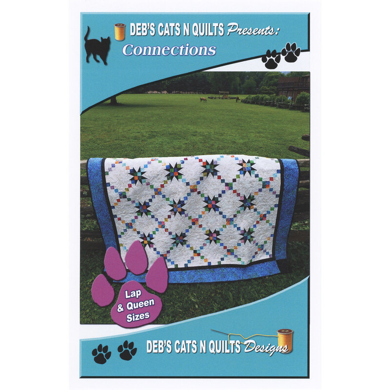 The front of the Connections pattern with the completed quilt displayed hanging over a fence.