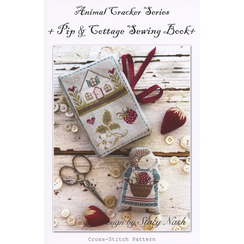 Front cover of the Animal Cracker Series Pip & Cottage Sewing Book pattern with the Pip and Sewing Book designs finished laid next to each other on a wooden plank backdrop surrounded by quilting supplies.