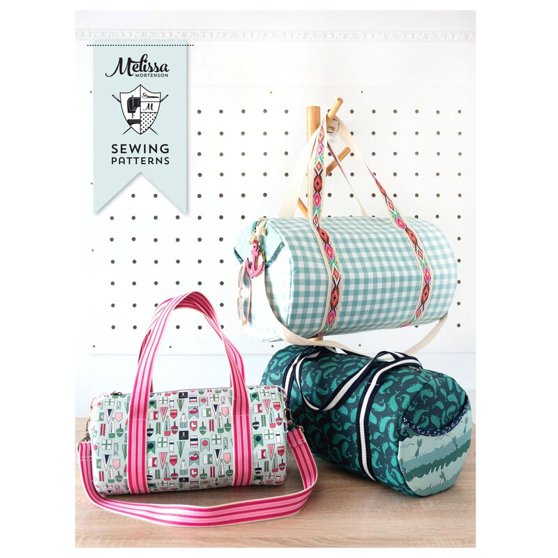 Front cover of The Saturday Duffle pattern featuring a 3 completed duffle project bags.
