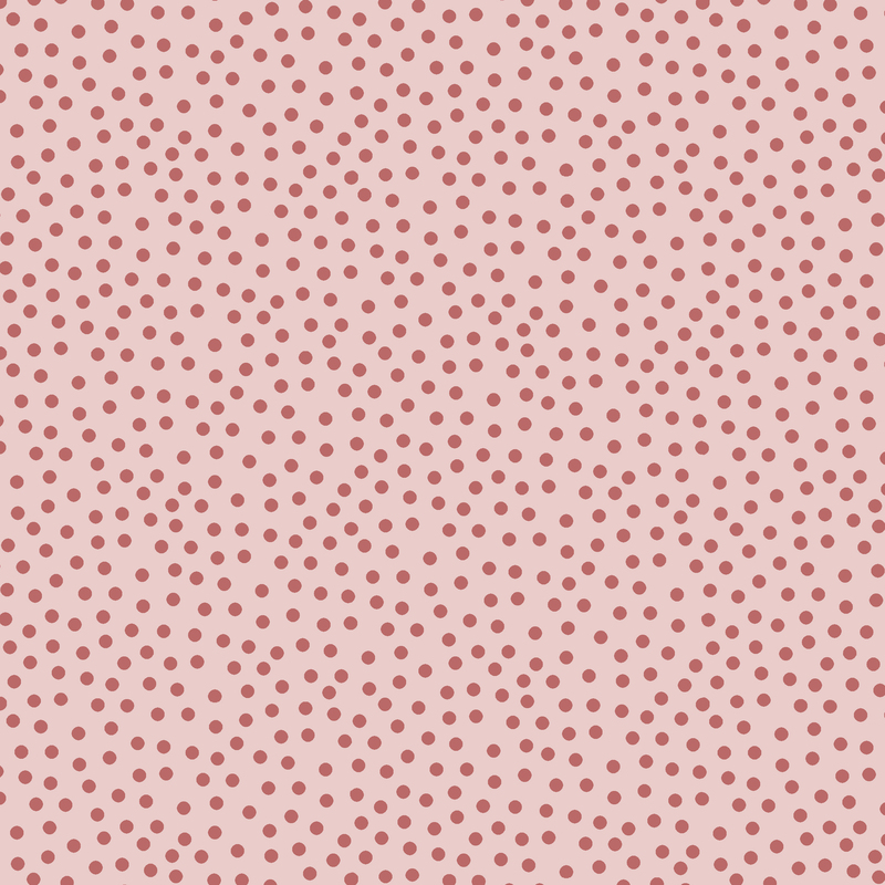 Soft pink fabric with a scattered pattern of dusty rose dots.