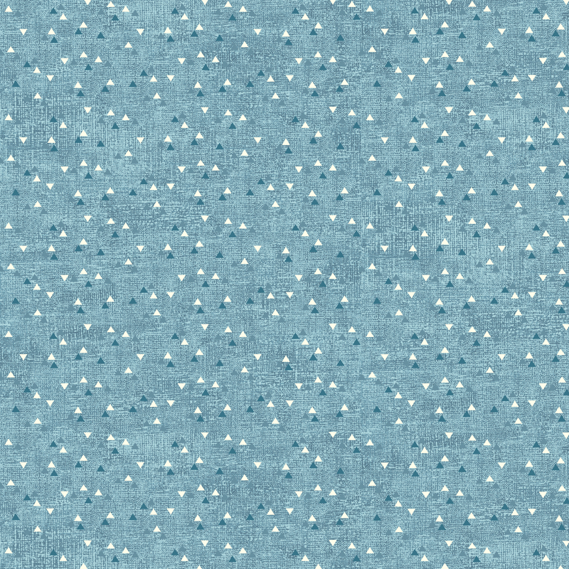 Faded, slate blue textured fabric with a geometric design of flipped tonal and white triangles.