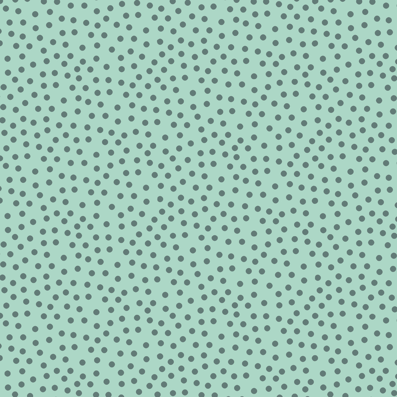 Light mint fabric with a scattered design of Xanadu green dots.