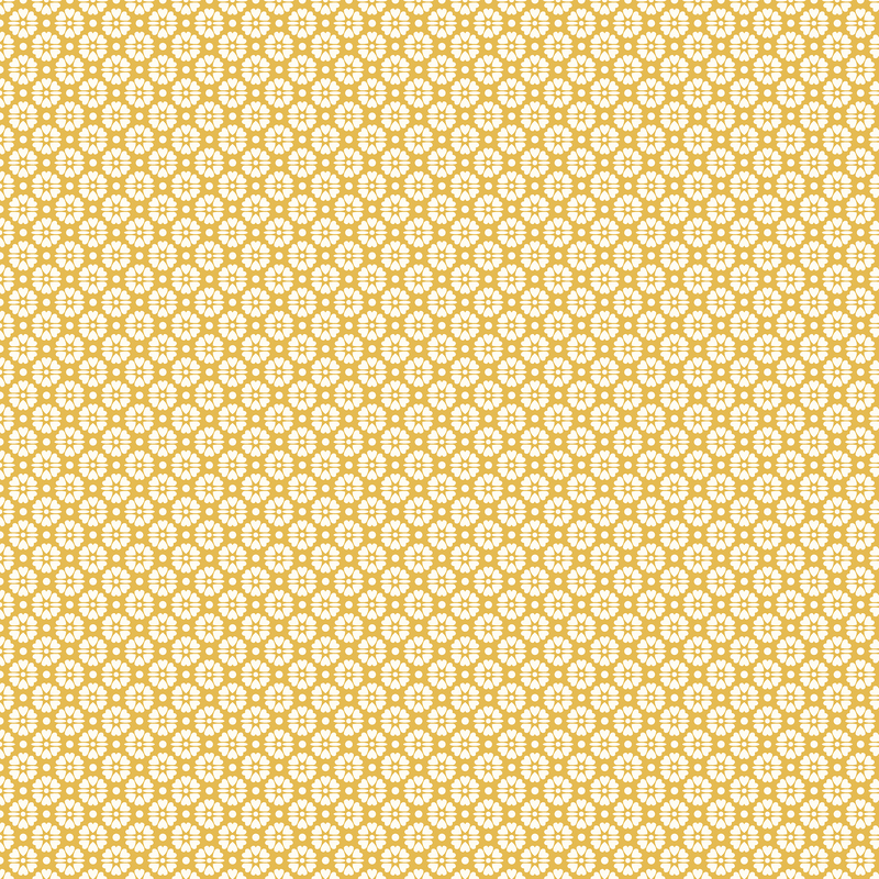 Dandelion yellow fabric with an intricate staggered grid of white florals made of small hearts, separated by dots.
