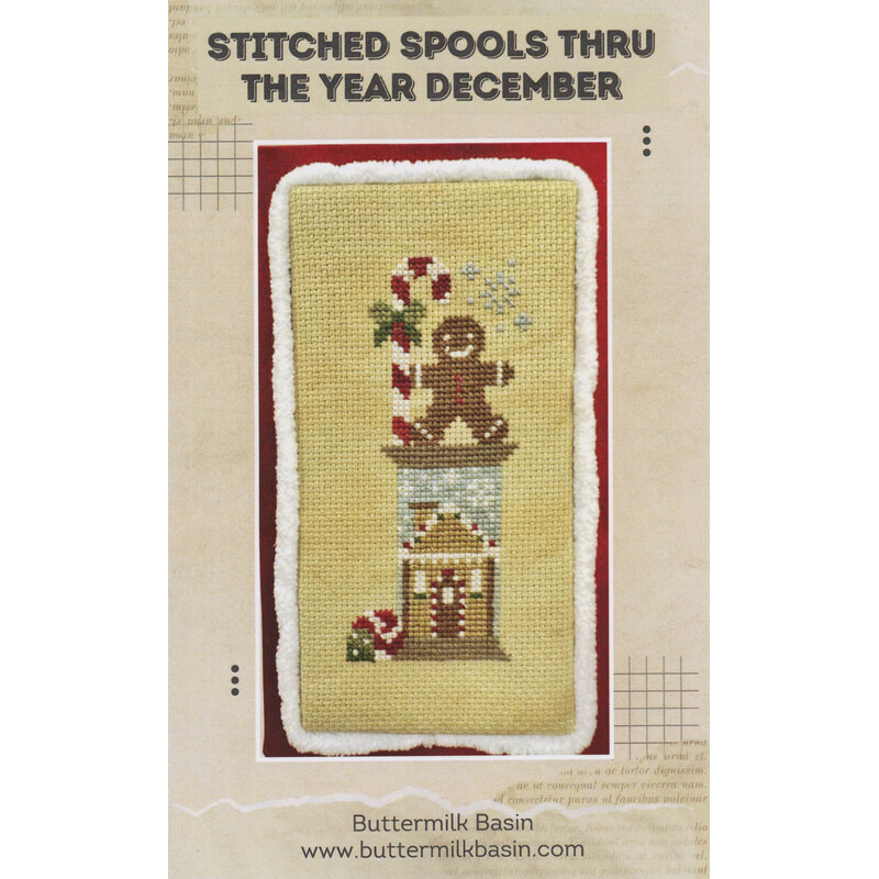 Cross-stitch pattern of a gingerbread man above a decorated house, titled “Stitched Spools Thru the Year December.”