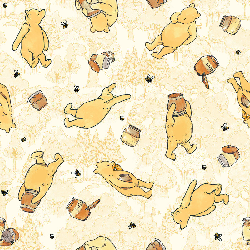 a warm buttercream fabric with Winnie the Pooh, honey pots, and bees. 