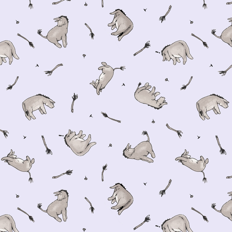 A lavender fabric with Eeyore in various poses along with scattered tails and tacks.
