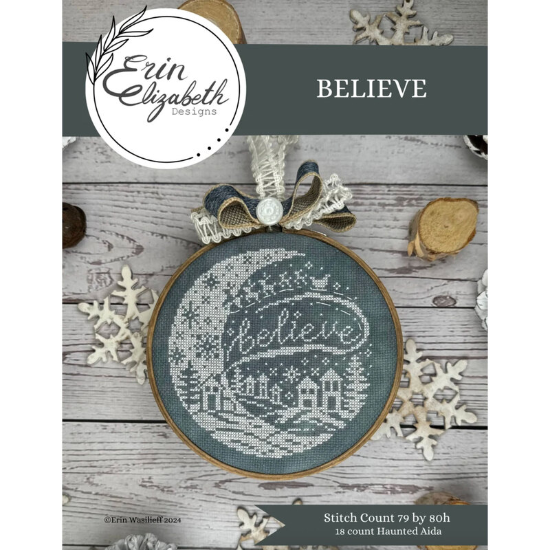 A finished and framed of the Believe pattern with coordinating décor and a stitch count in the bottom right corner. 
