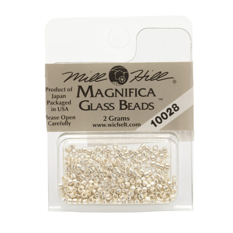 A package of Mill Hill Magnifica Glass Seed Beads in the color silver. 