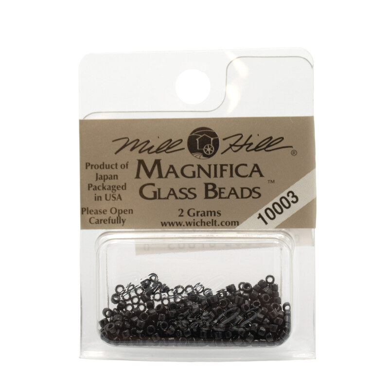 A package of Mill Hill Magnifica Glass Seed Beads in the color black. 