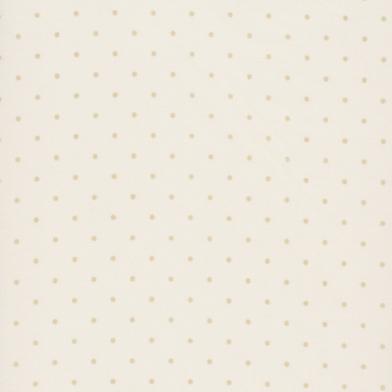 a soft cream fabric with a tonal beige polka dot pattern.