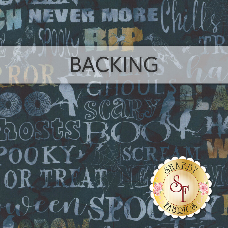 A dark blue fabric with fun typography of Halloween words and motifs; a transparent banner at the top reads "Backing." 